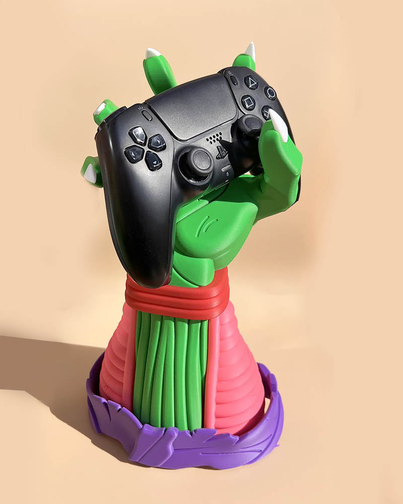 Controller holders for gaming set up decor, 3d printed dragon ball z piccolo holding a playstation 5 controller. gift for gamers