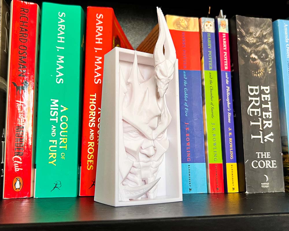 Lich King book nook inspired by World of Warcraft 3D printed fantasy shelf insert with icy helm and glowing eyes World of Warcraft Arthas book nook for gaming collectors Frozen throne inspired bookshelf décor with Lich King Dark fantasy book nook gift for WoW and RPG fans