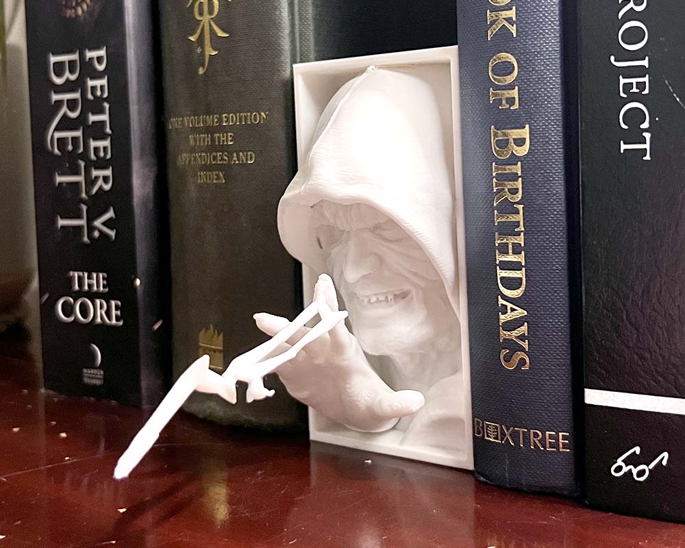 Palpatine book nook with lightning fingers Star Wars inspired 3D printed Emperor Palpatine Sith Lord shelf insert Dark Side book nook gift for Star Wars fans and collectors Hooded Palpatine book nook with Force lightning effect Star Wars bookshelf décor featuring Emperor Palpatine
