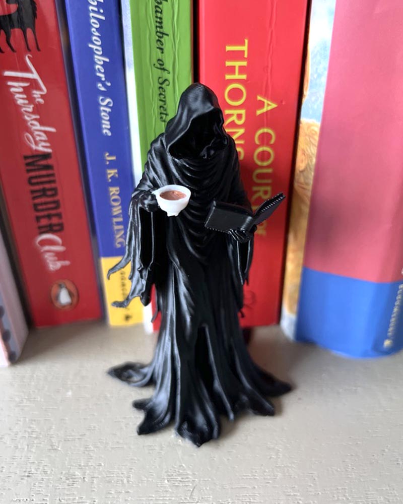 Suriel Leaning Book Figurine