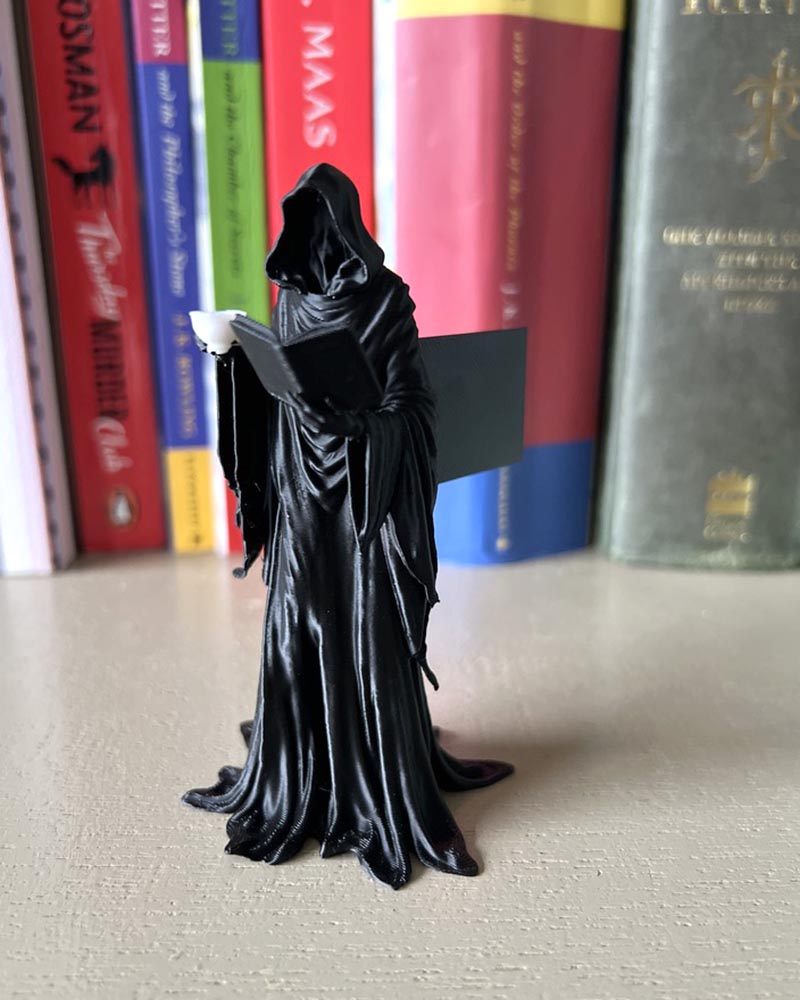 Suriel Leaning Book Figurine