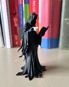 Suriel Leaning Book Figurine