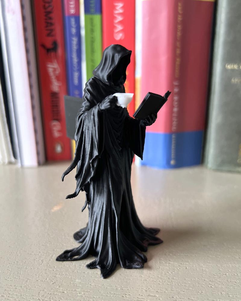 Suriel Leaning Book Figurine