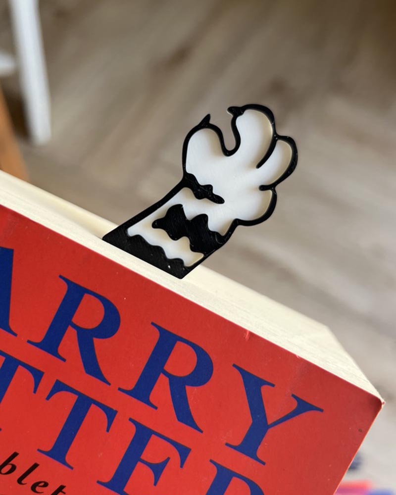 cute cat paw bookmark clawing out of book 3d printed 