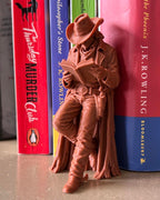 Cowboy Leaning Book Figurine
