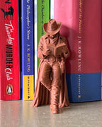 Cowboy Leaning Book Figurine
