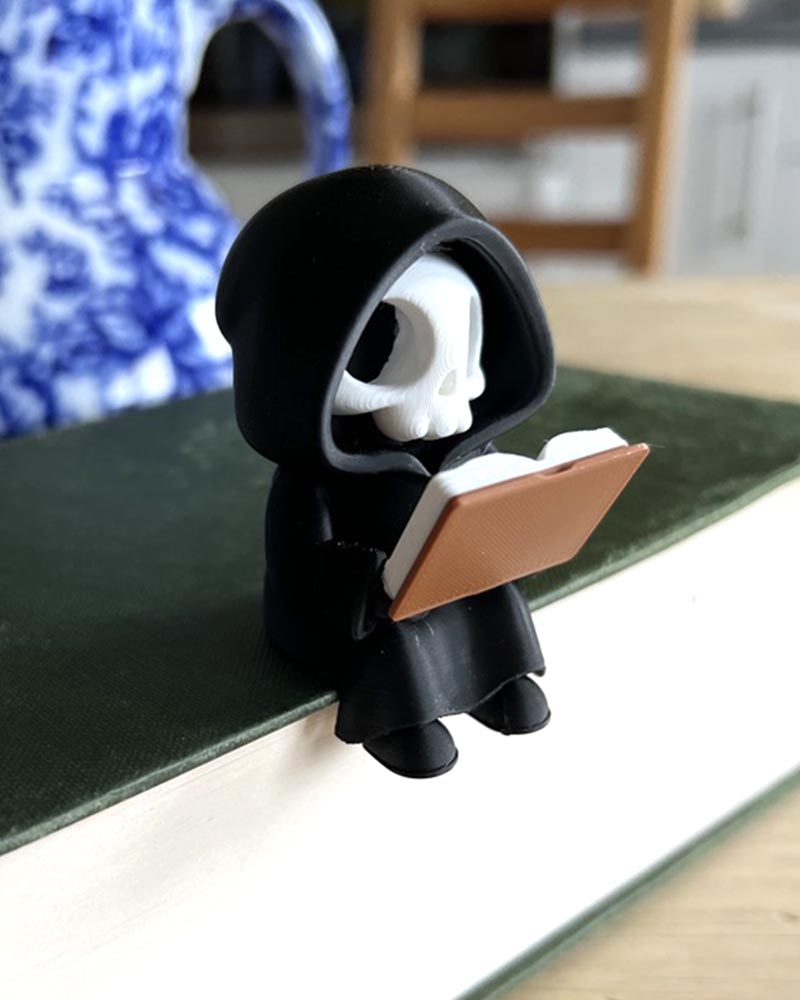 grim reaper shelf decor close up reading figure detail 3d printed book sit book nook shelf decor