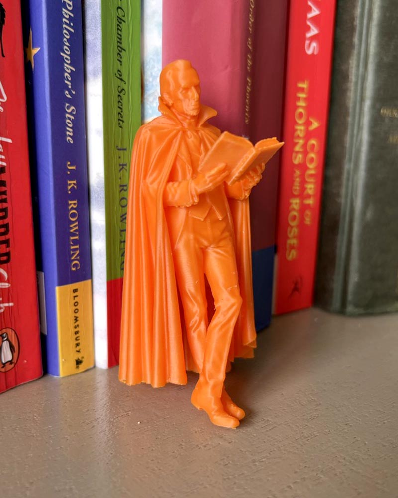 Dracula Leaning Book Figurine