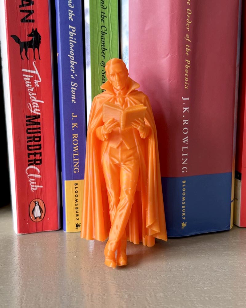 Dracula Leaning Book Figurine