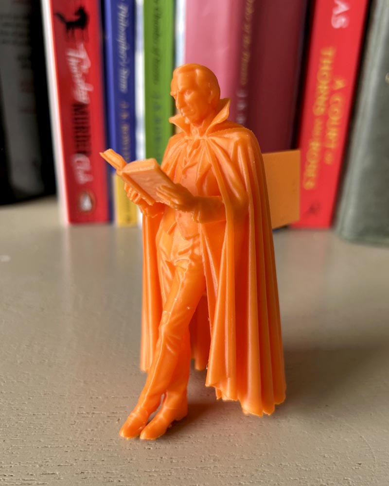 Dracula Leaning Book Figurine