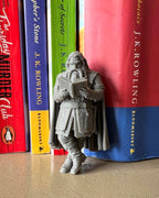 Dwarf Leaning Book Figurine