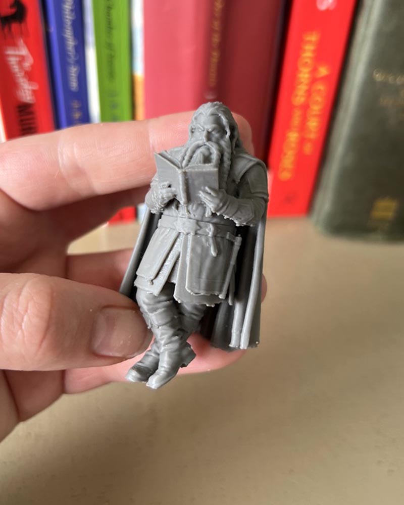 Dwarf Leaning Book Figurine