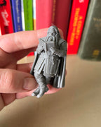 Dwarf Leaning Book Figurine