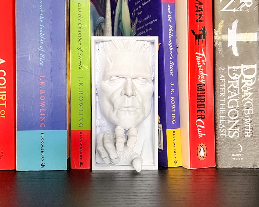 Frankenstein book nook with stitched face and bolts