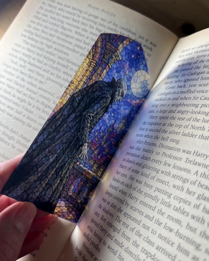 Gothic stained glass bookmark featuring a haunting Nosferatu-style vampire beneath a full moon. A unique gift for horror and vampire book lovers.
