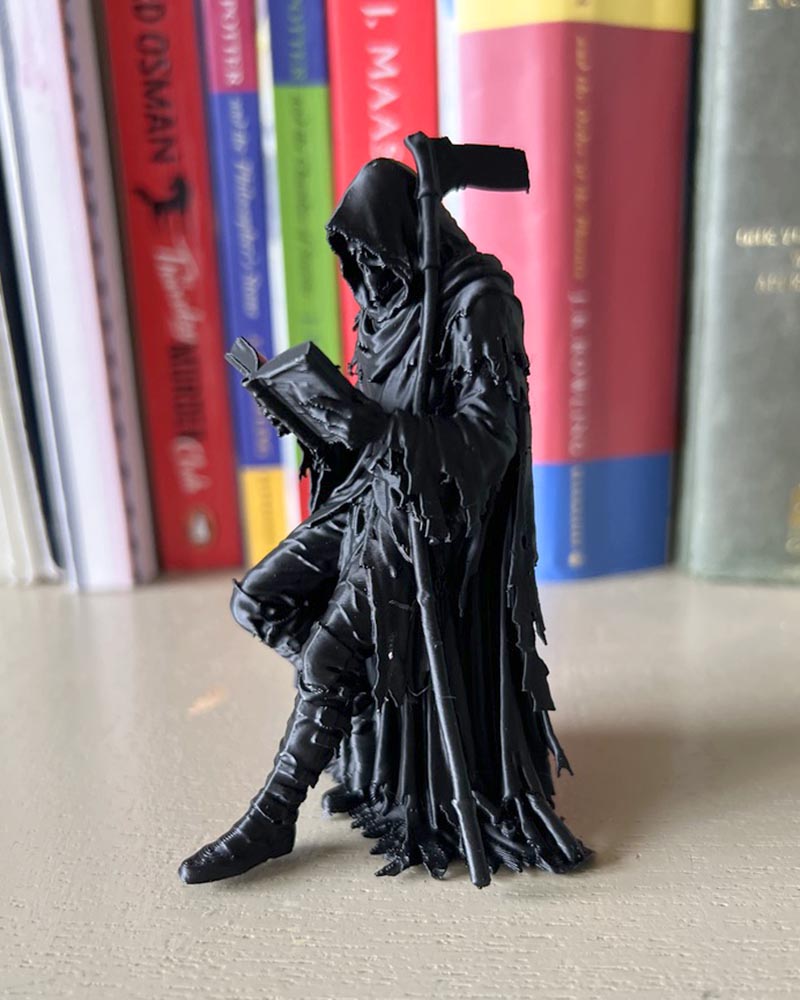 Grim Reaper Leaning Book Figurine