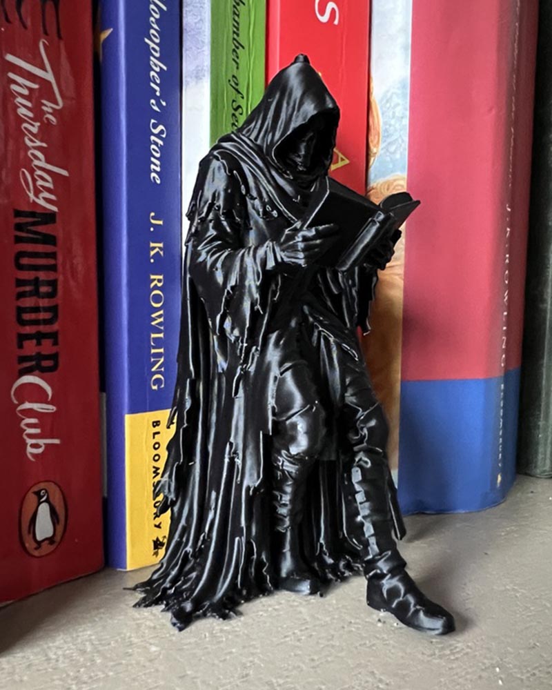 Grim Reaper Leaning Book Figurine