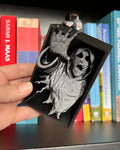 Dementor figure between books with flowing robes