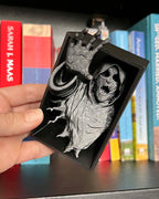 Dementor figure between books with flowing robes