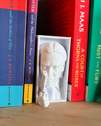 3D printed movie shelf insert with intense action film vibe