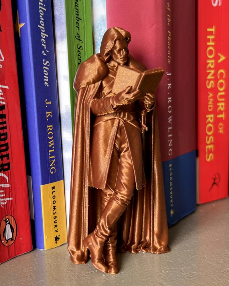 Jon Snow Leaning Book Figurine