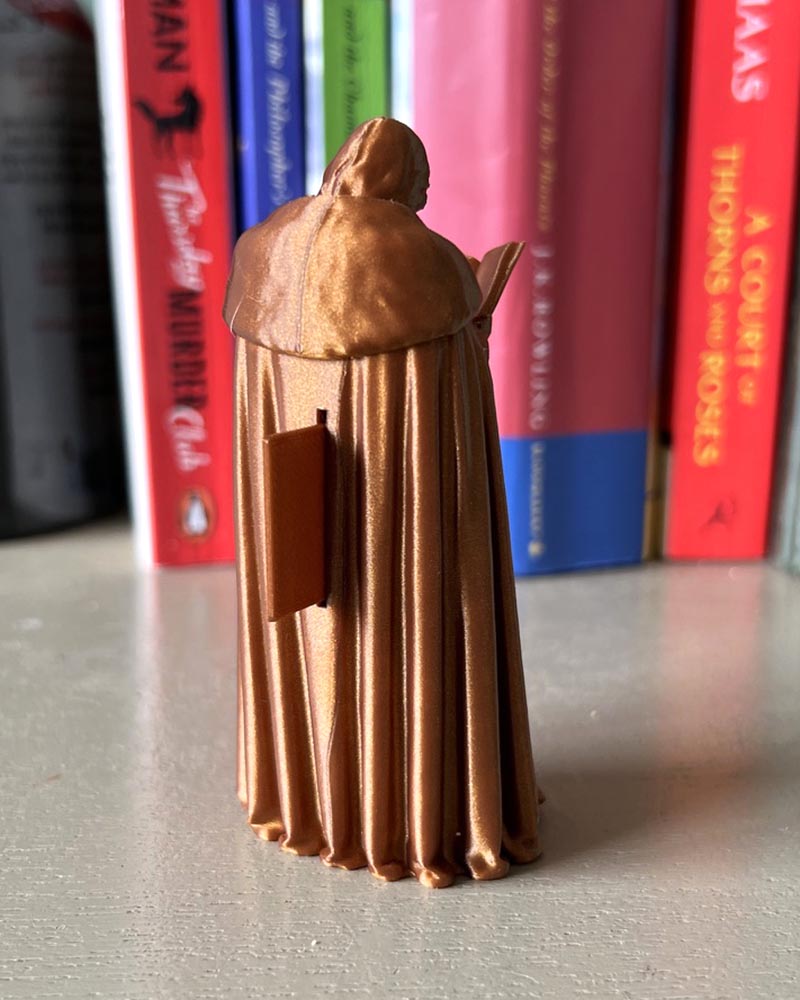 Jon Snow Leaning Book Figurine