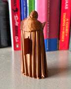 Jon Snow Leaning Book Figurine