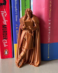 Jon Snow Leaning Book Figurine