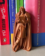 Jon Snow Leaning Book Figurine