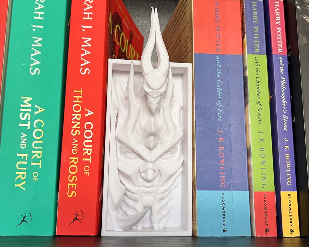 Lich King book nook inspired by World of Warcraft 3D printed fantasy shelf insert with icy helm and glowing eyes World of Warcraft Arthas book nook for gaming collectors Frozen throne inspired bookshelf décor with Lich King Dark fantasy book nook gift for WoW and RPG fans