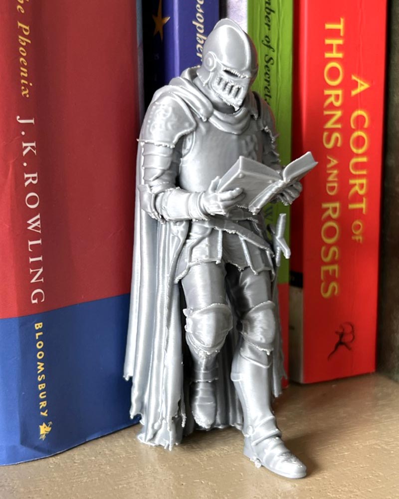Medieval Knight Leaning Book Figurine