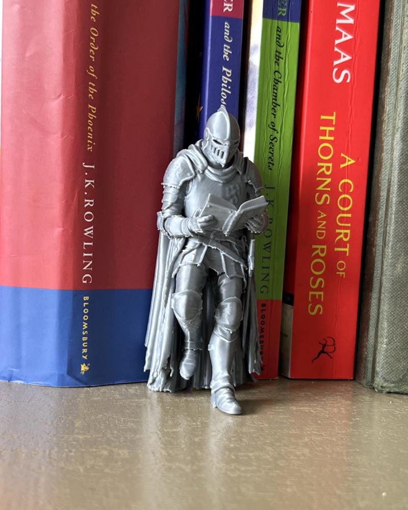 Medieval Knight Leaning Book Figurine