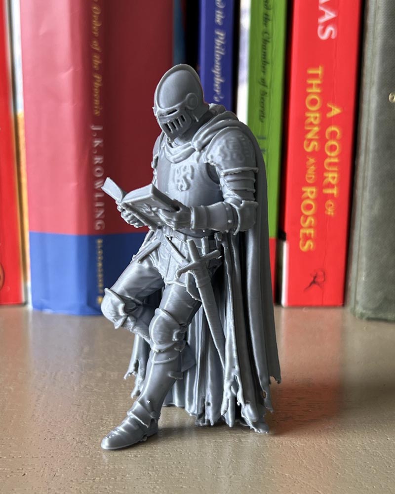 Medieval Knight Leaning Book Figurine