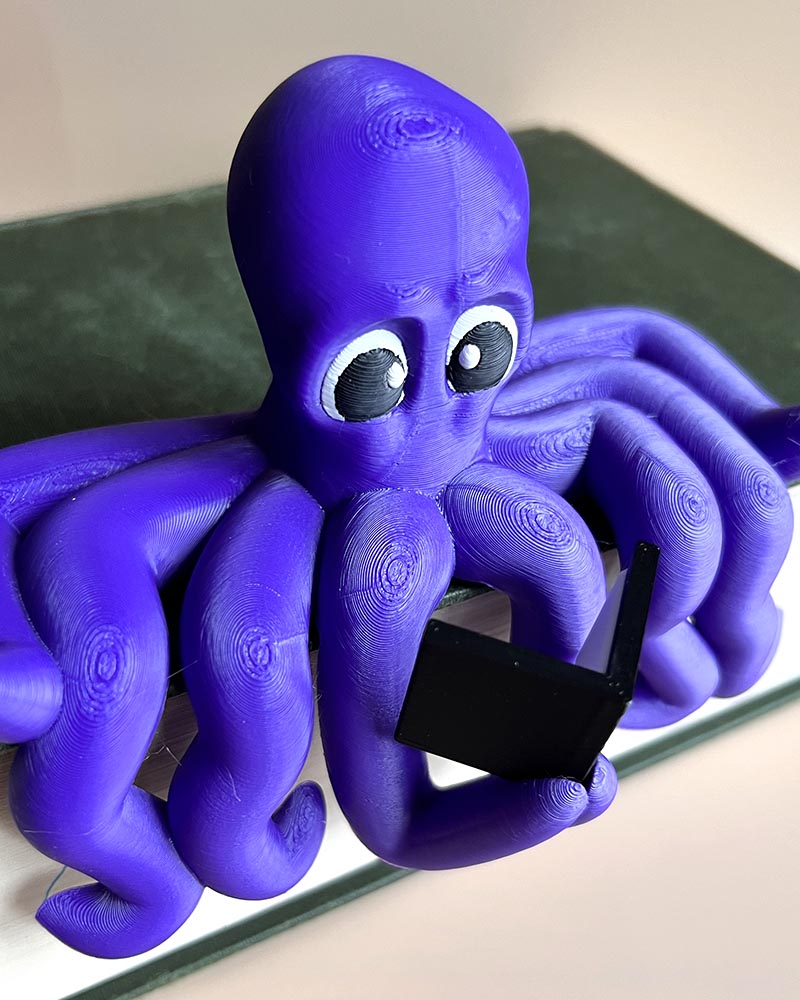 octopus shelf sitter on bookshelf edge cosy decor 3d printed fun decor for book nook