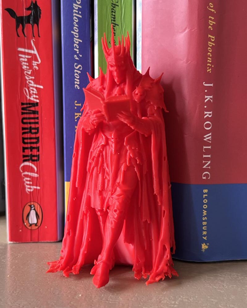 Skeleton King Reading Figure