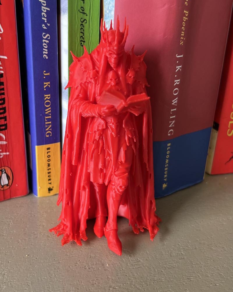 Skeleton King Reading Figure