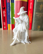 Wizzard Leaning Book Figurine
