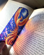 blue and gold phoenix stained glass style 3D printed bookmark featuring a mythical firebird beneath the moon and stars.