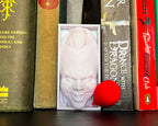 Pennywise book nook with red balloon IT inspired 3D printed horror shelf insert featuring Pennywise clown IT book nook gift for Stephen King and horror fans Creepy clown book nook décor with red balloon detail Gothic bookshelf insert Pennywise figure for collectors