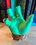 Fantasy gaming controller stand with detailed orc sculpture
