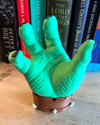 Fantasy gaming controller stand with detailed orc sculpture