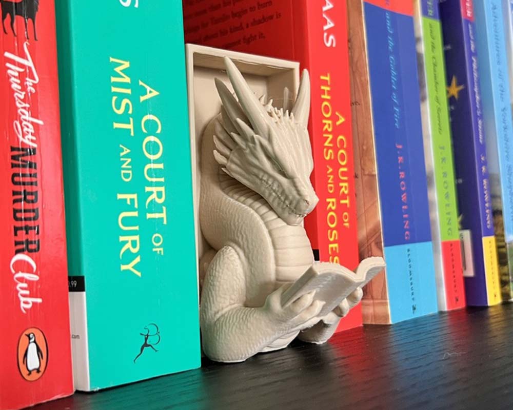 Dragon reading a book nook fantasy bookshelf insert 3D printed whimsical book nook with dragon figure Fantasy dragon book nook gift for readers and collectors Magical bookshelf décor featuring dragon reading Handmade book nook insert with dragon and book