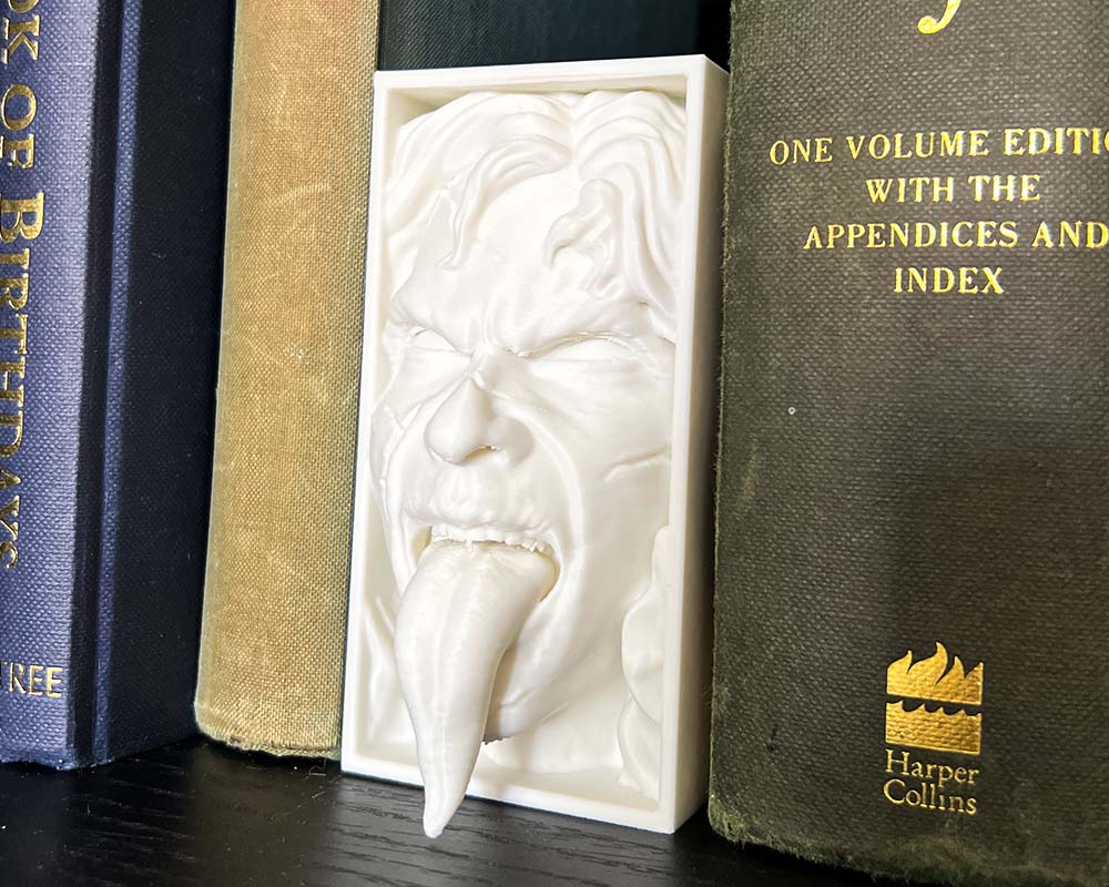 Exorcist book nook with possessed girl tongue out 3D printed horror shelf insert inspired by The Exorcist Gothic bookshelf decor featuring Exorcist possession sceneHorror movie book nook gift for collectors Demonic tongue-out figure book nook for horror fans